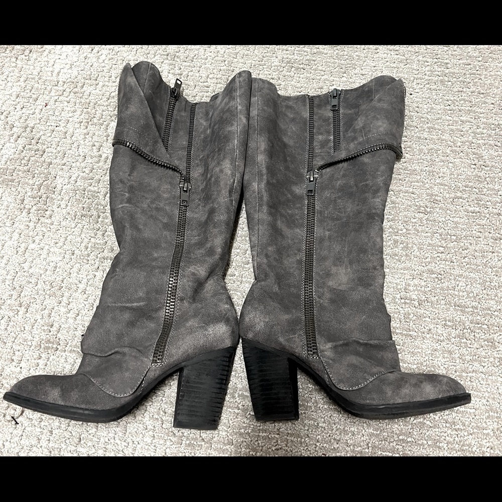 Grey high heeled leather boots